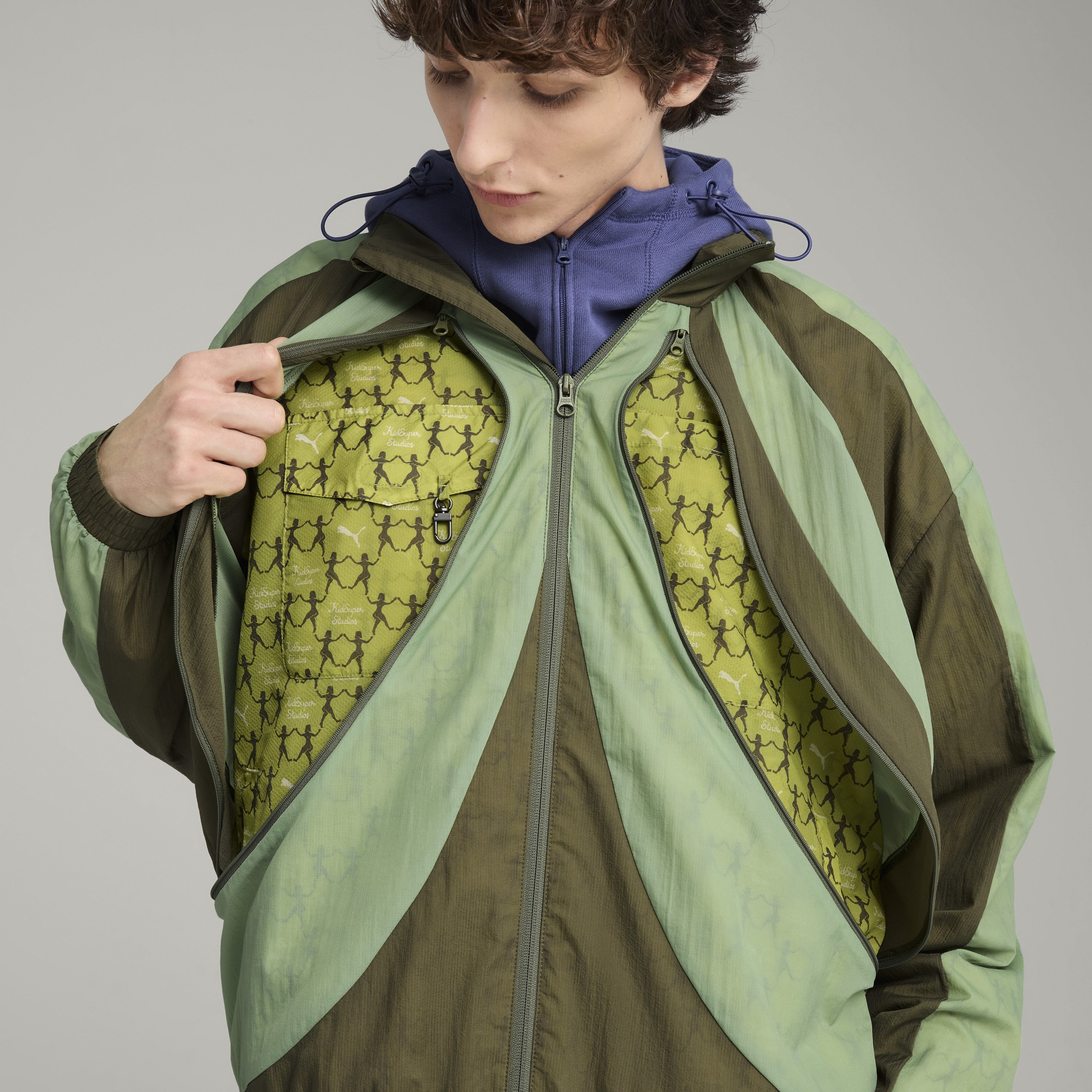 PUMA X KIDSUPER WINDBREAKER [Dusty Green]